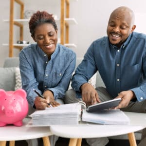 Happy couple reviewing financial plan together